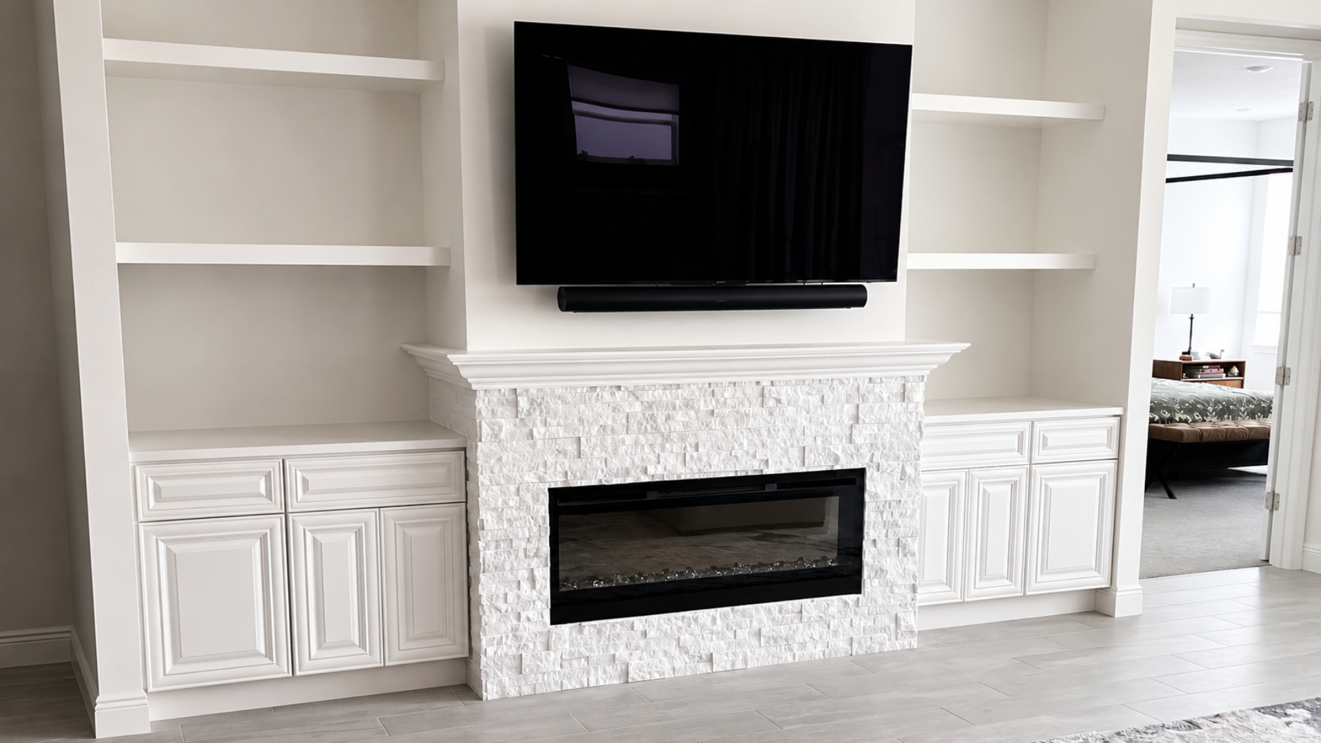 Custom fireplace surround and mantel as the focal point of the room